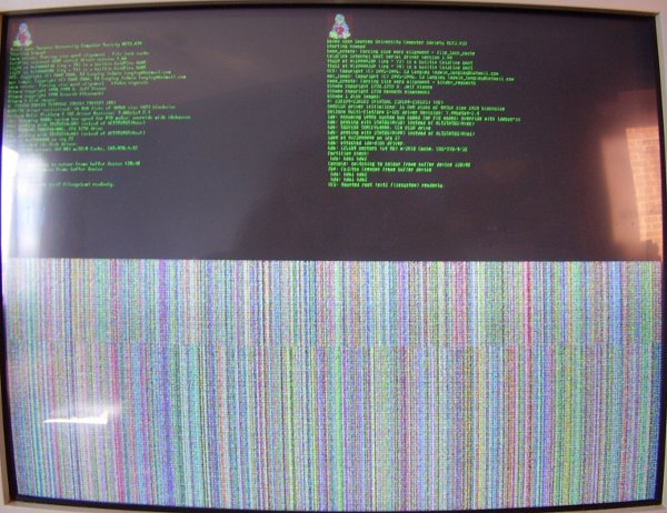 Incorrectly coloured and strided green  on black framebuffer console output, odd and even rows shown side by side on top half of screen only