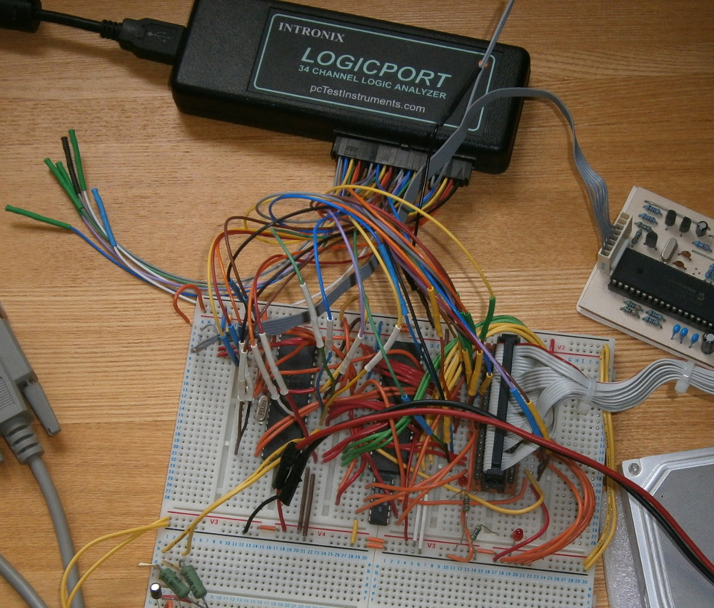 Photo of breadboard and logic analyser with its inputs connected to the PIC ATA circuit